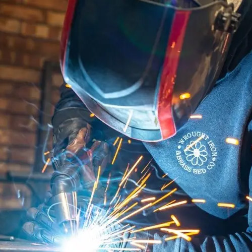 Welder in a mask welding